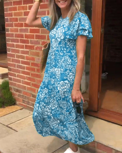 Lange jurk met korte mouwen en bloemenprint